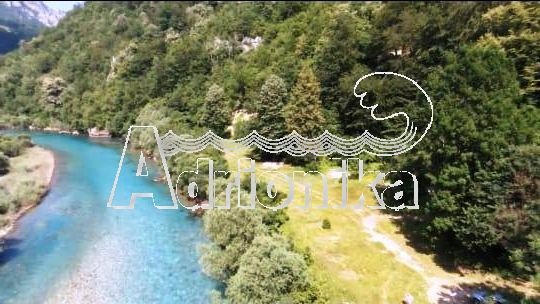 Участок на берегу реки Тара - фото