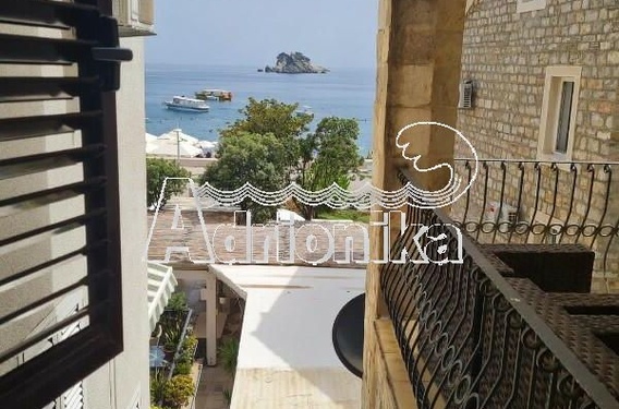 Просторная квартира с одной спальней на первой линии моря, Петровац - фото