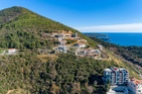 Урбанизированный участок в Будве с видом на море и Старый город