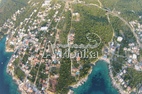 Урбанизированный участок в Утехе, район Видиковац, ниже магистрали - фото