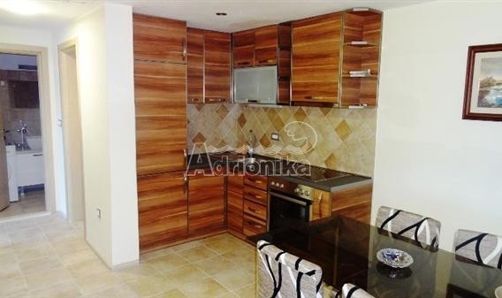 Квартира в элитном комплексе с бассейном в Доброте - фото