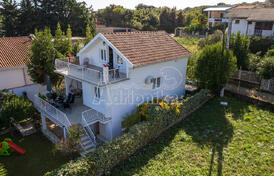 Дом с гаражом в Утехе